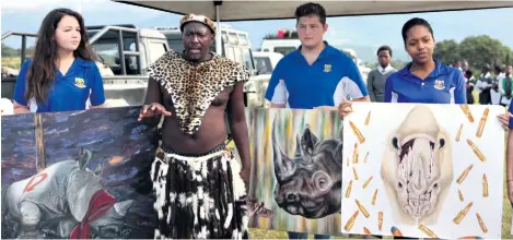 ??  ?? Richards Bay High School learners showing their rhino artwork are Salome Walters, Edward Bekker and Anna Muanza with Richard Mabanga (second left)