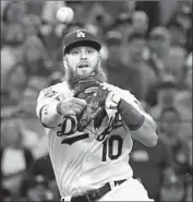  ?? Wally Skalij Los Angeles Times ?? IF THE DODGERS sign a free-agent third baseman, Justin Turner would shift infield positions.