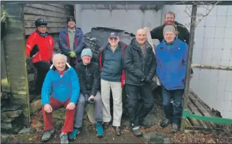  ??  ?? Helpers David Doogan; David Rounce, museum re-developmen­t manager; Sandy Coldwell; Jon Ure; John Poolman; Bill Strachan; Ewan Smith and William Stewart with the boat.