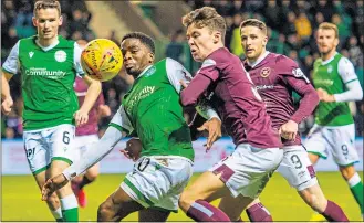  ??  ?? Action from March’s Edinburgh derby at Easter Road