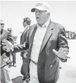  ?? MATTHEW BUSCH MATTHEW BUSCH, GETTY IMAGES ?? Donald Trump talks to reporters after exiting his plane in Laredo, Texas, during a trip to the border on July 23.