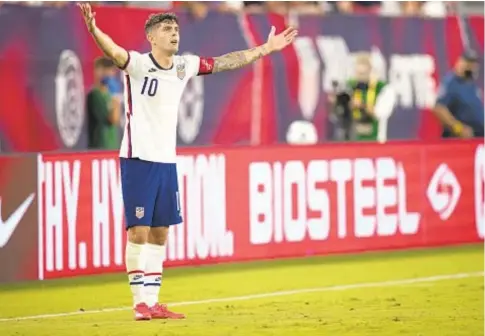  ?? GETTY ?? Christian Pulisic protests call against him during second half of Sunday night’s World Cup qualifying match against Canada.