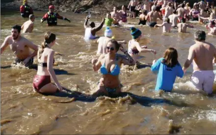  ?? FRAN MAYE — MEDIANEWS GROUP ?? Dozens of people took the Polar Plunge Saturday morning in the Brandywine Creek.