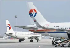  ?? TANG KE / FOR CHINA DAILY ?? China Eastern aircraft on the tarmac at the internatio­nal airport in Yantai, Shandong province.