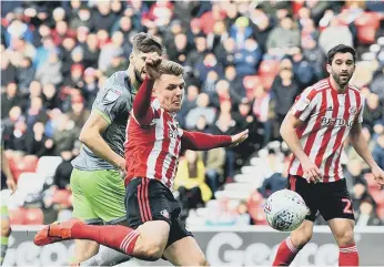  ??  ?? Max Power has a go at goal.