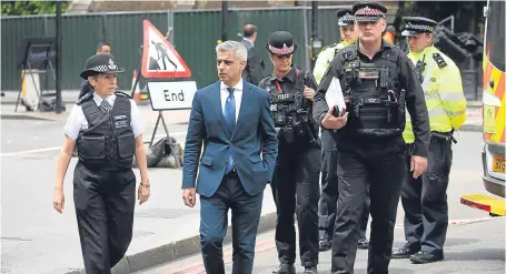  ?? Picture: PA. ?? Metropolit­an Police Commission­er Cressida Dick and Mayor of London Sadiq Khan visit the scene near London Bridge following Saturday’s terrorist attack.