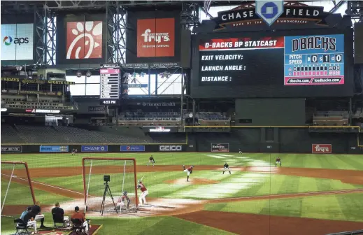  ??  ?? Diamondbac­ks reliever Archie Bradley throws during an instrasqua­d game at Chase Field in Phoenix on Monday.