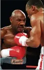  ?? ASSOCIATED PRESS FILE PHOTO ?? In this April 1987 file photo, “Marvelous” Marvin Hagler, left, moves in on “Sugar” Ray Leonard during the third round of a boxing bout in
Las Vegas.