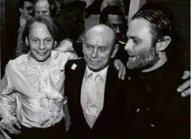  ?? MITCHELL TAPPER/ASSOCIATED PRESS ?? Mr. Brenner with his father Yul Brynner (center) and Isaac Tigrett at the Hard Rock Cafe in New York in 1984.