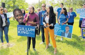  ?? RICARDO RAMIREZ BUXEDA/ORLANDO SENTINEL ?? University of Central Florida student Sofia Garduno speaks at a Democratic rally on campus. A recent Quinnipiac poll on the governor’s race shows Democrat Andrew Gillum up 21 percentage points on Republican Ron DeSantis among women.