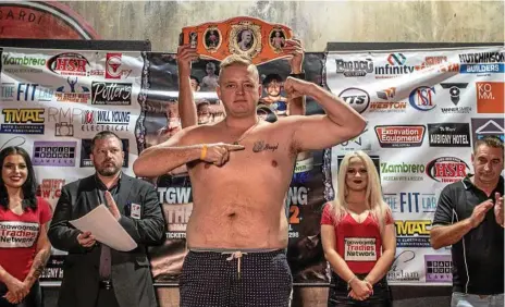  ?? Photo: TANNER SMITH ?? THIS IS FOR YOU BRAYD: Toowoomba's Joel "Power" Stower at yesterday's TGW &amp; Smithy Bring The Big Fights media weigh-in at The Vault. Stower tonight returns to the ring at Rumours after an 18-month break to box in memory of the late Brayd Smith.