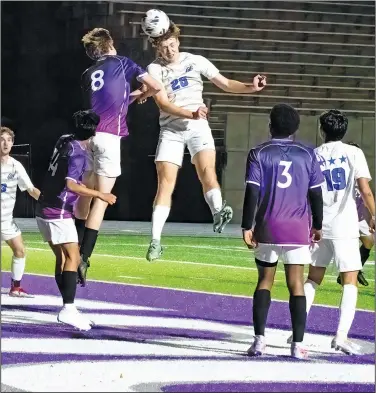  ?? Southern Sass/Special to the News-Times ?? Defense: El Dorado's Eli Waller goes into the air to defend against Conway's Ian Booy's header as Alex Flores and Will Obiozo defend. The Wildcats will host Sheridan Tuesday.