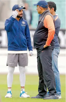  ?? — PTI ?? Skipper Virat Kohli and coach Ravi Shastri.
