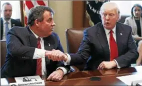  ?? ASSOCIATED PRESS ?? New Jersey Gov. Chris Christie and President Donald Trump in March discussing the opioid crisis.