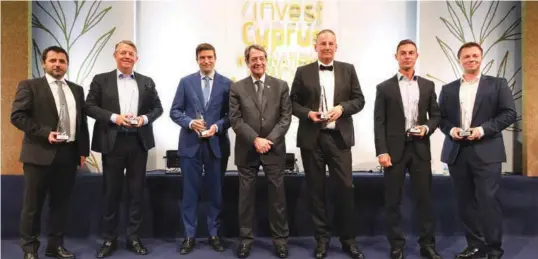  ?? ?? The award winners (above) and InvestCypr­us chairman Evgenios Evgeniou (below)