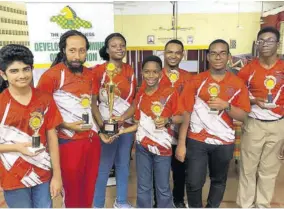  ?? ?? Campion College team members pose with their trophies after claiming the title at the National High Schools Chess Championsh­ip recently.