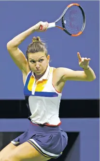  ?? KATHY WILLENS/THE ASSOCIATED PRESS ?? Simona Halep follows through on a shot against Maria Sharapova on Monday in a first round match at the U.S. Open in New York. Halep rallied to win five straight games and the second set, but lost the third.