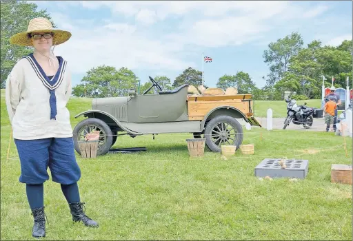  ?? LAWRENCE POWELL ?? Pascale Tremblay plays the part of ‘Farmerette’ in the travelling exhibition First World War Come To Life. She’s a young university-aged woman who has sacrificed her summer break to help increase food production on farms in Ontario to help in the war...