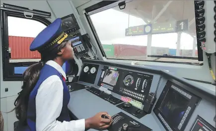  ?? PROVIDED TO CHINA DAILY ?? Concilia Owire operates a train in Kenya.