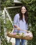 ?? Amy Neunsinger ?? Joanna Gaines of the hit show, “Fixer Upper,” in her garden in Waco, Texas.