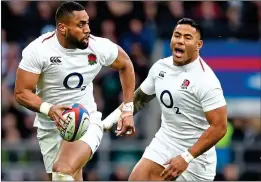  ??  ?? THE BIG BOYS: Joe Cokanasiga (left) and Manu Tuilagi were rampant in England’s backline against overpowere­d Italy at Twickenham yesterday