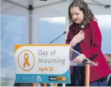  ??  ?? Silver Kuris reads from her poem to her father Sam Kuris at the 2015 Fallen Workers Day ceremony in Vancouver.