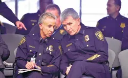  ?? Robin Jerstad / Contributo­r ?? Police Chief William McManus confers with Capt. Karen Falke before briefing the City Council’s Public Safety Committee about a drop in major crimes.