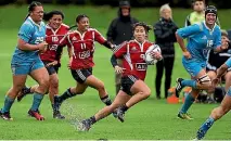  ?? PHOTO: DAVID UNWIN/FAIRFAX NZ ?? Kristina Sue, centre, is one of four Manawatu players named in the Black Ferns squad.