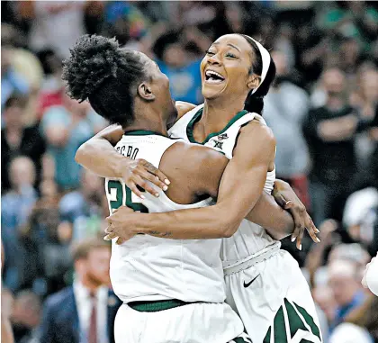  ?? CHRIS O’MEARA/AP ?? 82 81 Chloe Jackson, right, and Queen Egbo celebrate after Baylor’s national championsh­ip victory Sunday.