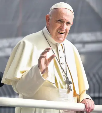  ??  ?? The Pope arrived in Ireland for a two-day visit yesterday, and apologised for the Catholic Church’s failure to address child sex abuse. Pope Francis said he ‘cannot fail to acknowledg­e’ the ‘grave scandal’ and described it as a source of pain and shame