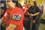  ?? Christina House Los Angeles Times ?? GENESIS DIAZ, 24, of South L.A. stands with other opponents of Airbnb at a City Council meeting.