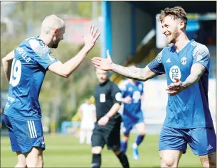  ?? PIC: Darren Murphy ?? PUT IT THERE! Luke Summerfiel­d, left, celebrates FC Halifax’s third goal