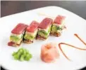  ?? ANDREW MEADE/ COURTESY ?? Osaka- style press sushi with tuna and avocado at Grille 401 in Fort Lauderdale.