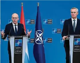  ?? Foto: Anadolu via Getty Images ?? NATO-Generalsek­retär Jens Stoltenber­g (r.) und Premiermin­ister Luc Frieden geben nach ihrem Treffen im NATO-Hauptquart­ier in Brüssel am 7. Dezember 2023 eine gemeinsame Pressekonf­erenz.