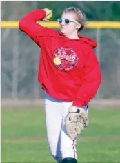  ??  ?? Sophomore Hope Hartle makes a toss during a Lady Ramblers practice.