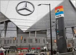  ?? STEVE SCHAEFER/AJC 2018 ?? MARTA’s governing board has approved a branding partnershi­p deal with Atlanta United that would include prominent placement of the transit agency’s logo at the MLS team’s home Mercedes-Benz Stadium.