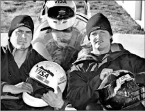  ?? LARRY MACDOUGAL FOR THE TORONTO STAR ?? Canadian bobsledder Nathan Cunningham, right, holds an old helmet that has seen better days, while teammate Bret Bresciani, who’s had a couple of serious crashes, cradles the new helmet.