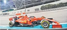  ?? — AFP photo ?? Ferrari’s German driver Sebastian Vettel steers his car at the Yas Marina Circuit in Abu Dhabi, during the final race of the season.