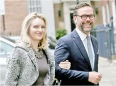  ??  ?? James Murdoch, the son of media mogul Rupert Murdoch, and his wife Kathryn Hufschmid arrive for a reception in this file photo. — Reuters photo