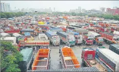  ??  ?? ▪ Trucks parked inside APMC Truck Terminal in Navi Mumbai on Friday. In Lucknow, about 10K trucks were parked at various places. 93 50% lakh total truckshave joined strike