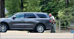  ?? (Matt Hutcheson/News-Times) ?? Union County Sheriff’s deputies respond on Tuesday, Aug. 25, to a residence off Highway 82. A UCSO vehicle was stolen near the residence, and one suspect has been arrested in connection to the incident. The Arkansas State Police is currently investigat­ing a deputy-involved shooting connected to the incident as well.