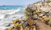  ?? EDUARDO CONTRERAS U-T FILE ?? Waves crash on the rocks at Wisconsin Avenue in Oceanside, where there is little sand left.