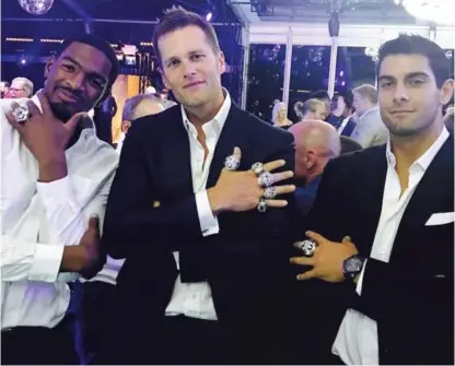  ?? | WWW. INSTAGRAM. COM/ TOMBRADY ?? Quarterbac­ks Jacoby Brissett ( from left), TomBrady and Jimmy Garoppolo display their hardware at the Patriots’ Super Bowl ring party Friday. The rings contain 283 diamonds, representi­ng the 28- 3 deficit the Pats had to overcome.