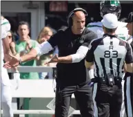  ?? Bill Kostroun / Associated Press ?? Jets coach Robert Saleh argues with referees during the first half of Sunday’s loss to the Patriots.