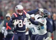  ?? Steven Senne / Associated Press ?? New England Patriots wide receiver Kendrick Bourne (84) runs with the ball away from Tennessee Titans inside linebacker Jayon Brown during the second half on Sunday in Foxborough, Mass.