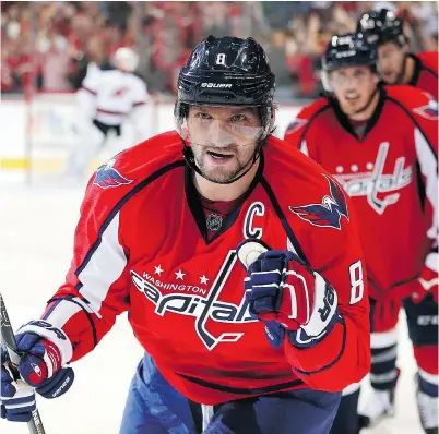  ?? PATRICK SMITH / GETTY IMAGES ?? Washington Capitals sniper Alex Ovechkin celebrates a goal. Getting over that throat-constricti­ng feeling of “Am I really
going to be out there against this guy?” is a coming-of-age obstacle every young player has to hurdle, writes Cam Cole.