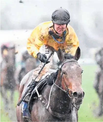  ??  ?? Hastings-trained Louboutin has her ears pricked as a mud splattered Lisa Allpress urges her to the finish line in a Rating 65 race over 1340m at Wanganui on Thursday of last week. It was the filly’s second consecutiv­e win, and both have been on the Wanganui track.