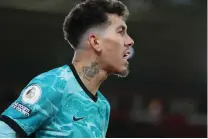  ?? | NAOMI BAKER AFP ?? LIVERPOOL midfielder Roberto Firmino is back.