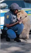  ??  ?? Constable Ziduyile Cele and her partner, Lucy, who she often refers to as her third baby.