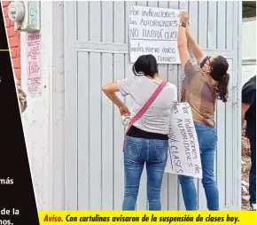  ?? ?? Aviso. Con cartulinas avisaron de la suspensión de clases hoy.